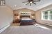 Expansive Primary Suite with a Vaulted Ceiling and Walk-In Closet