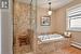 Luxurious Five-Piece Primary Ensuite with Soaker Bathtub and Separate Shower