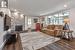 Family Room with a Wet Bar, Gas Fireplace, and Hot Water In-Floor Heating