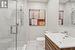 Three-Piece Bathroom with a Frameless Glass Shower