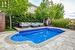 The Private Back Yard Oasis Beckons with an Inviting Inground UV Filtered Pool