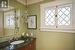 Charming/large main floor powder room