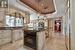 Gourmet Kitchen Featuring Granite Countertops and Top-Of-The-Line Appliances
