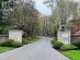 Sprawling 2.5 Acre Parcel of Meticulously Manicured Grounds!