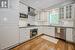 Kitchen with Granite Countertops and Built-In S/S Appliances