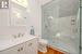Luxurious Three-Piece Main Bathroom with an Oversized Glass Shower