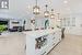 Stunning Kitchen Equipped with Quartz Countertops and Backsplash