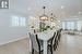 Stunning Kitchen Equipped with a Breakfast Bar and Built-In Dining Table