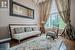 Living Room with a Vaulted Ceiling and Hardwood Floor