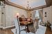 Dining Room with a Coffered Ceiling and Hardwood Floor