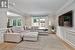 Family Room with Wainscoting and a Gas Fireplace