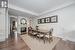 Dining Room with 9' Ceiling and Two-Sided Gas Fireplace