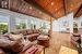 Living Room with Woodburning Fireplace and Exposed Wood Vaulting Ceiling