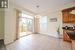 Dining room with light tile patterned floors