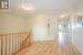 Hallway featuring light wood-type flooring