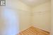 Walk in closet featuring wood-type flooring