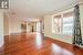 Unfurnished living room with hardwood / wood-style flooring