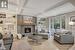 Living room featuring a fireplace, beamed ceiling, built in features, and ornamental molding