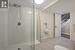 Basement Bathroom featuring stand alone shower