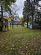 View of yard with a wooden deck