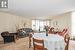 Dining room with light colored carpet