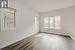 Empty room featuring wood-type flooring