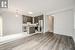 Kitchen with a kitchen island, tasteful backsplash, sink, hanging light fixtures, and stainless steel appliances