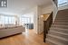 Living room featuring light hardwood flooring