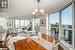 DINING AND LIVING ROOM W/ENGINEERED HARDWOOD, EXPANSIVE WINDOWS