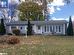 Ranch-style house with a front yard