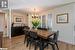 Dining room featuring a notable chandelier and light hardwood / wood-style flooring