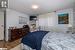 Bedroom featuring  wood-style flooring