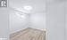 Unfurnished room with light hardwood / wood-style flooring