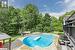 View of pool featuring a patio, an outdoor hangout area, and a gazebo