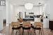 Kitchen with backsplash, white cabinetry, light hardwood / wood-style floors, and appliances with stainless steel finishes