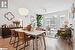 Dining room featuring ceiling fan and light hardwood / wood-style flooring