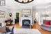 Living room featuring ornamental molding and light wood-type flooring