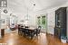 Dining room with hardwood / wood-style flooring and ceiling fan