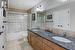 The upper level 5 piece bathroom with granite countertops