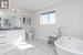 Ensuite. Photo of staged show home of similar plan, not exact unit.
