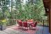 Lots of room on the deck for outside dining in a private treed setting