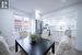 Dining area with light wood-type flooring