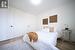 Bedroom featuring hardwood / wood-style flooring