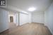 Basement featuring light hardwood / wood-style floors