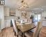 Dining room with wine cooler and light wood-type flooring