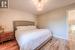 Bedroom featuring hardwood / wood-style flooring