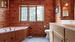 Spacious upstairs bathroom with soaker tub and standing shower