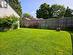 Partially fenced yard with great growing conditions!