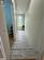Hallway to private bathroom and kitchenette