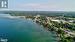 Aerial looking down coast with pin of subject property